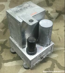 MI-8319 Alimentatore a vibratore  MI-8319  Alimentatore CC con vibratore a 6Volt e valvola raddrizzatrice Accessori per apparati radio Militari